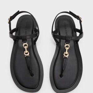 Charles & Keith Black Sandals with Gold Accents